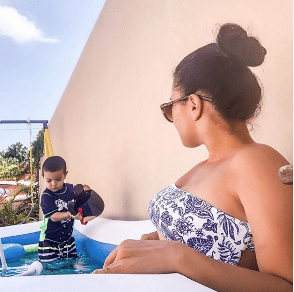 mom and kid in the pool