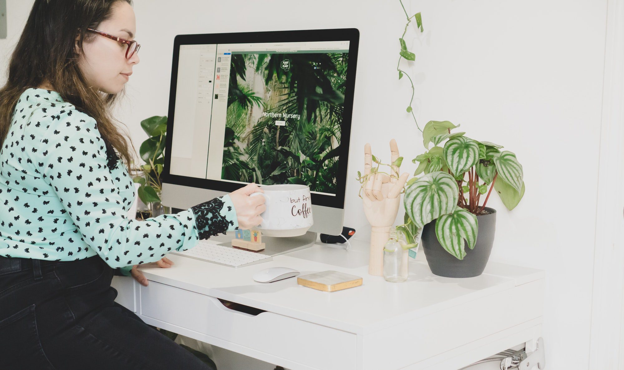 Empowered woman working from home starting the day right with her mug of coffee.