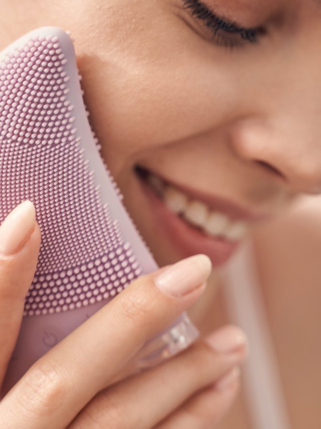 Beautiful Caucasian lady performing an exfoliation procedure