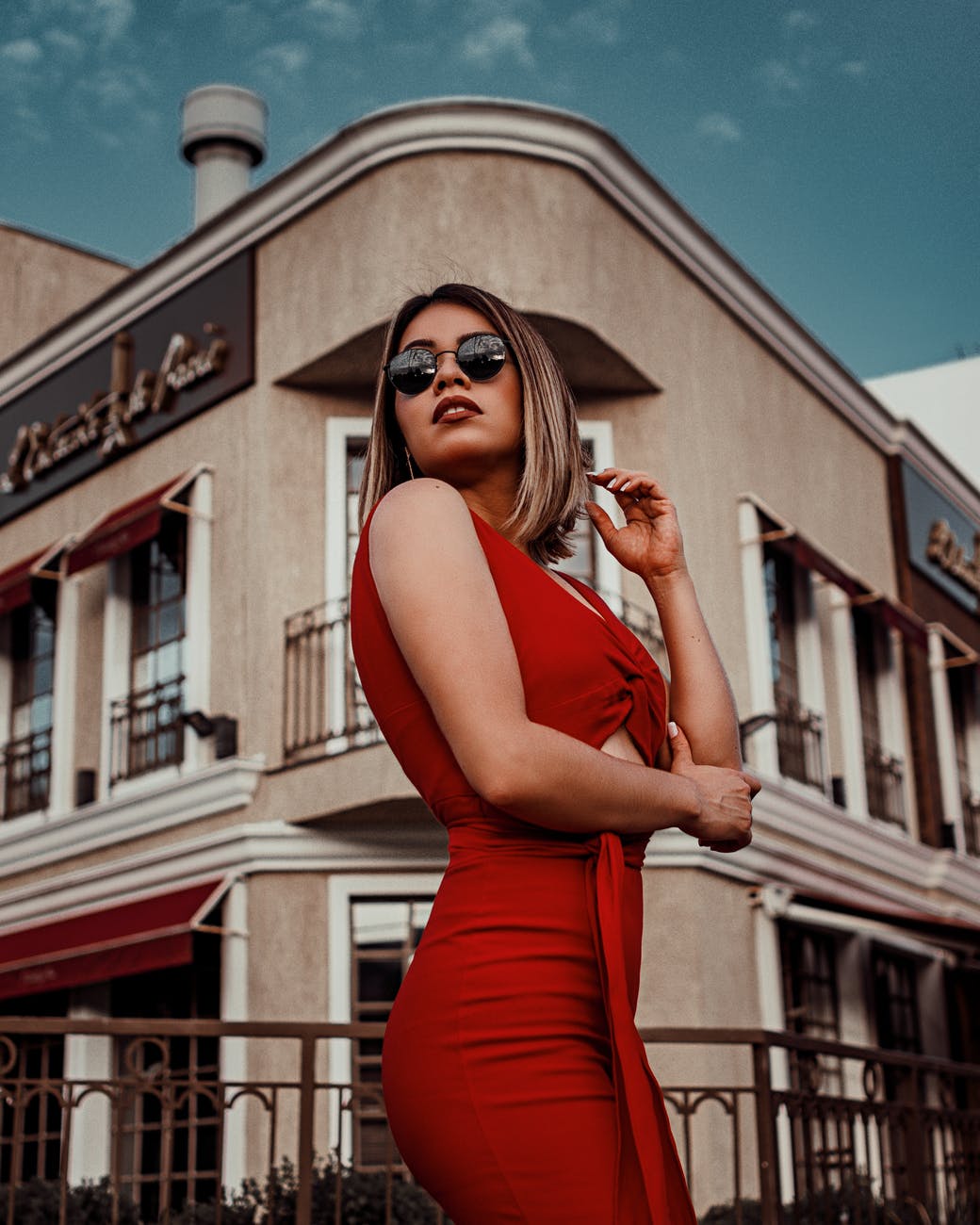 woman wearing red bodycon dress