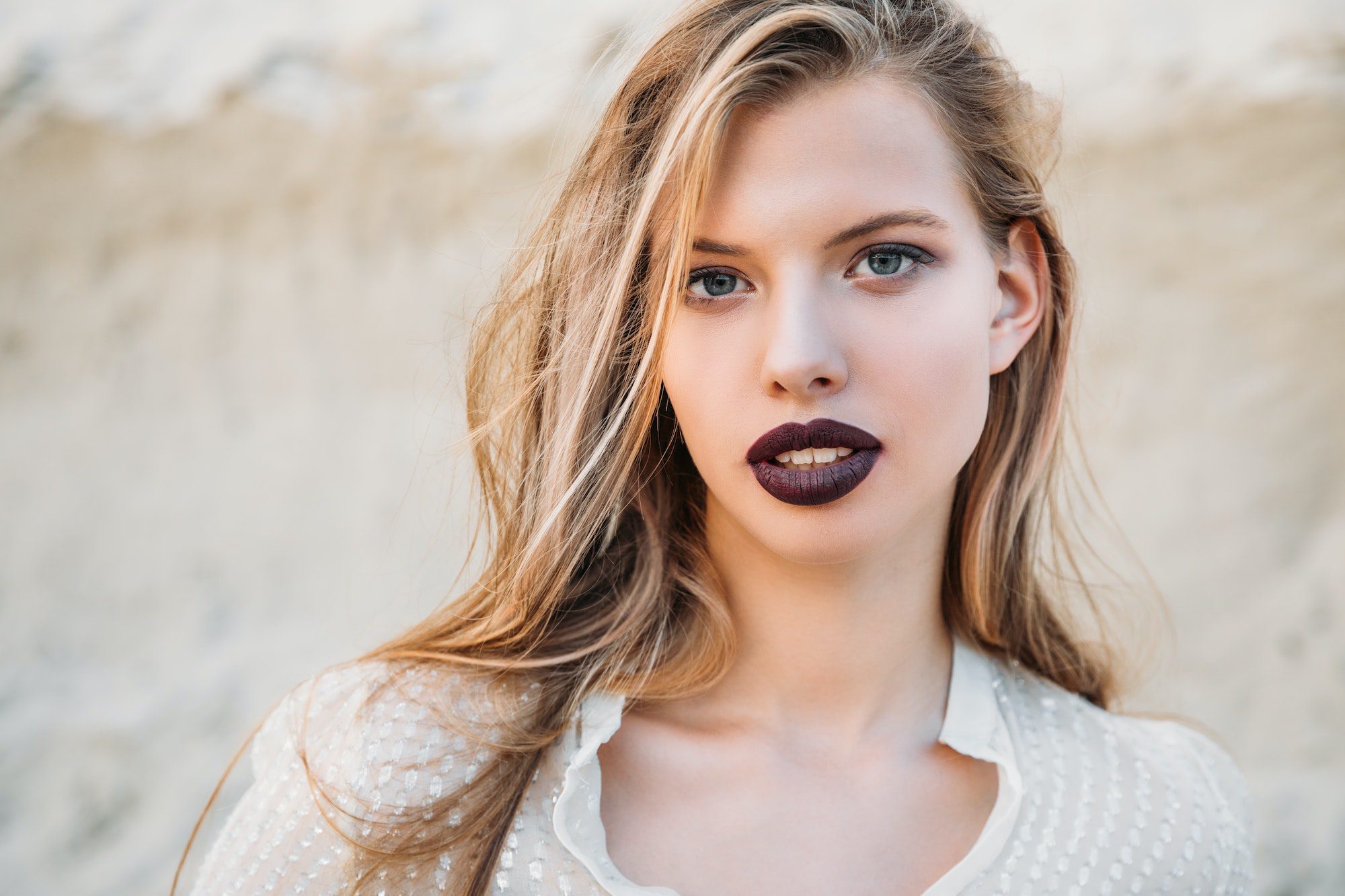 beautiful blonde girl with dark lipstick